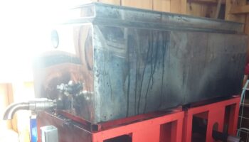 Maple sap boiling in an evaporator.