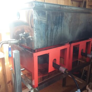 Maple sap boiling in an evaporator.