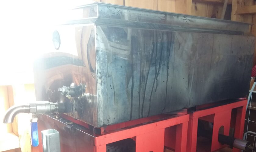 Maple sap boiling in an evaporator.